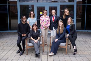 Photograph of the Caxide Scholars with the Caxide's. Taken during the 2025 Caxide Scholars Symposium